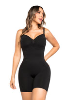 Woman wearing a black shapewear bodysuit